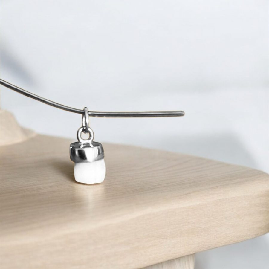 Colgante con diente de leche